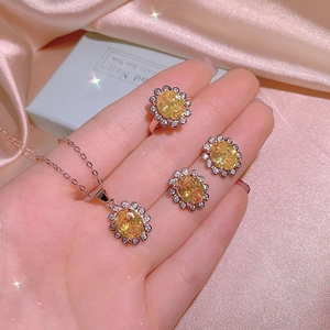 Flower shaped yellow citrine necklace and jewelry set in rose gold with oval cut stones