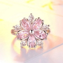 Macro shot of cherry blossom ring with pink marquise zircon and silver plating