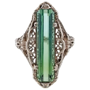 Vintage silver ring with rectangular emerald-cut green stone and filigree detailing