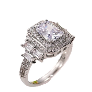 Exquisite square zircon ring with emerald cut main stone and double halo setting