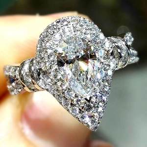 Bague de fiançailles poire avec double halo et anneau torsadé micro-pavé pour femme