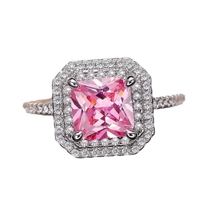 Luxury pink princess cut cubic zirconia ring with double halo pavé setting and diamond band