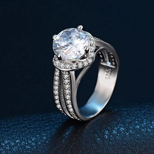 Sparkling S925 sterling silver ring with large round zircon on dark blue leather