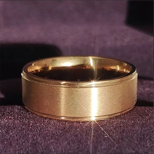 Men's gold wide stainless steel ring with matte brushed surface and polished beveled edges