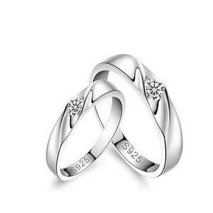 Paire élégante de bagues de couple en argent 925 avec design entrelacé et zirconiums