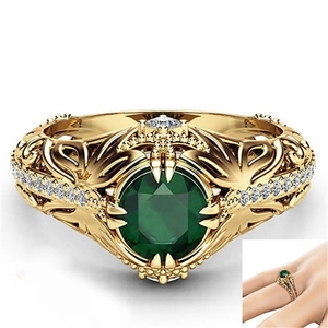 Luxurious 14k gold plated ring with oval emerald gemstone and paved micro diamonds