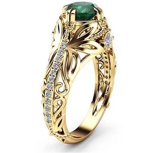 Anello lussuoso placcato oro 14k con smeraldo e design a vite intricato
