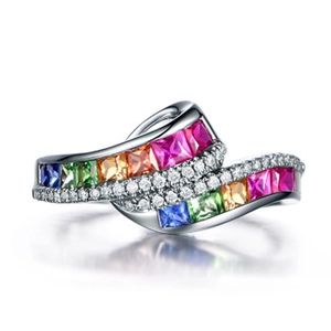 Platinum plated wave ring featuring sparkling rainbow cubic zirconia and multi-layer stones