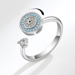 Adjustable silver anti-anxiety spinning ring with sparkling evil eye zircon disc