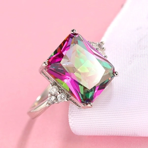 Elegant silver ring featuring a large rectangular rainbow zircon and side accents