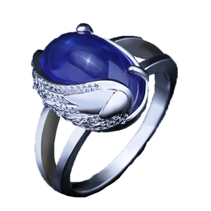 Elegant angel wing ring with oval blue sapphire and sparkling white zircon stones
