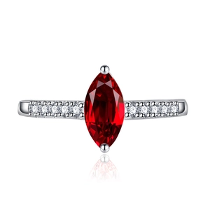 Elegant marquise cut ruby ring in silver with sparkling side stones and a white background