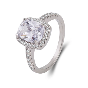 Luxurious cushion cut halo engagement ring in silver with pavé set diamond stones
