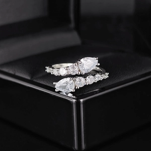 Elegant silver snake ring with pear-cut cubic zirconia in an adjustable open-end design