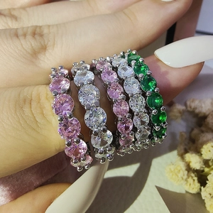 Stackable eternity rings with colorful round zircon stones in silver claw setting