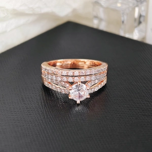 Macro shot of rose gold plated stackable ring set featuring brilliant round cut zircon stones