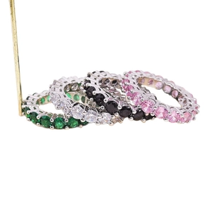 Exquisite silver ring set with vibrant emerald, clear, black, and pink cubic zirconia