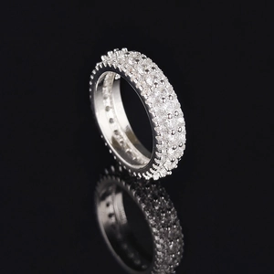 Exquisite silver-toned pavé setting zircon stackable ring on reflective black background