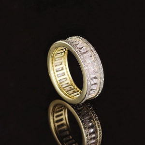 Elegant gold-plated hip hop ring featuring baguette-cut stones and crystal pavé details