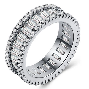 Hip hop style silver plated ring featuring baguette and round cut full diamond setting