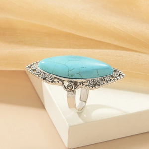 Ethnic vintage silver ring with large marquise turquoise stone and bohemian hollow patterns