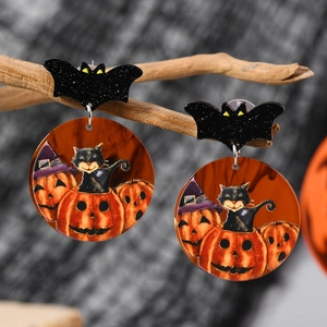 Halloween acrylic earrings featuring bat, pumpkin wizard, and black cat on wood branch
