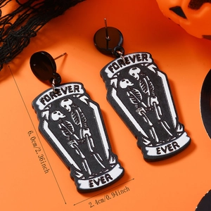 Detail of coffin acrylic earrings with skeleton print and size 6.0cm by 2.4cm