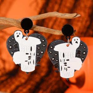 Halloween heart earrings featuring ghost and coffee cup on branch against orange backdrop