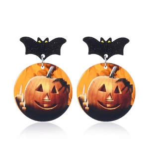 Halloween cartoon pumpkin and bat earrings made of matte black acrylic on white background