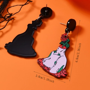 Detail showing red rose pattern acrylic drop earrings with 6.0cm length measurement