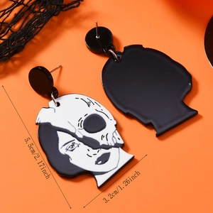 Detail view of Halloween ghost skull earrings with dimensions 5.5cm by 3.2cm