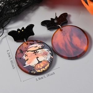 Detail view of Halloween acrylic earrings featuring pumpkin moon print and bat stud design