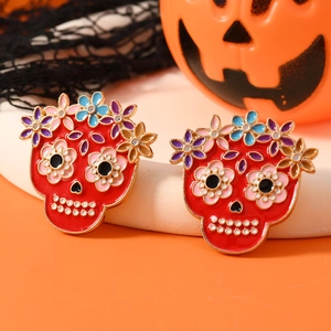 Halloween Day of the Dead skeleton enamel brooch with colorful flower crown on orange background