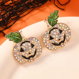 Sparkly Halloween pumpkin stud earrings with colorful rhinestones on a festive background
