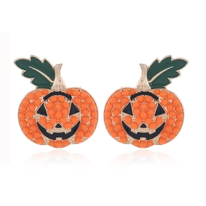 Handcrafted Halloween pumpkin stud earrings with orange bead texture and green leaves