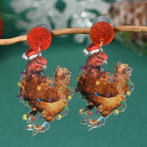 Detail of Christmas rooster acrylic earrings featuring a festive hat and lights on a branch
