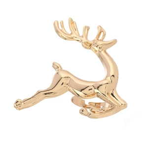 Golden reindeer napkin ring made of polished alloy with adjustable opening for table decor