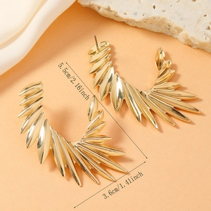 Detailed view of gold sunburst snake earrings with 5.5cm by 3.6cm size measurements