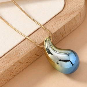 Retro punk teardrop pendant necklace with gold to blue gradient on snake chain