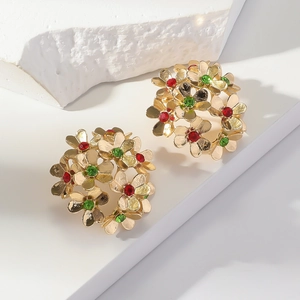 Exaggerated gold floral cluster earrings with red and green rhinestones in 3D design