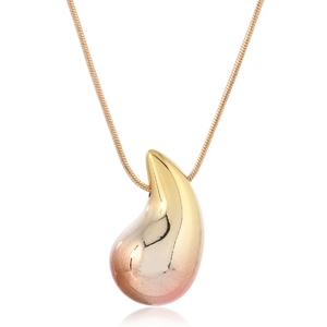 Polished gold teardrop pendant on a sleek snake chain necklace in minimalist punk style
