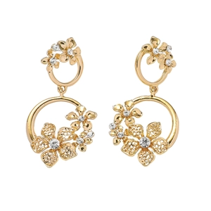Detail of gold double-layer floral drop earrings with clear crystal rhinestones