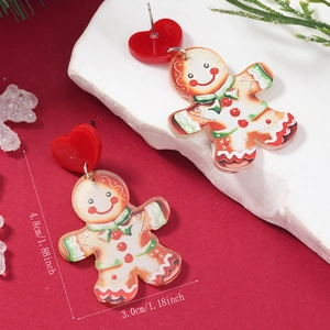 Détail des boucles d'oreilles bonhomme en pain d'épices avec dimensions 4,8 cm par 3,0 cm