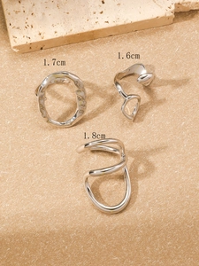 Detailed view of three irregular liquid metal rings with diameters 1.6cm, 1.7cm and 1.8cm