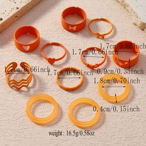 Detailansicht des 10-teiligen orangefarbenen Ring-Sets mit Maßen und Gewichtsangaben