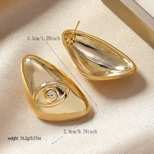 Detail view of gold octopus eye earrings with dimensions 3.3cm by 2.0cm and weight info