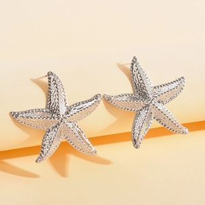 Boucles d'oreilles étoile de mer en argent texturé au style nautique pour l'été