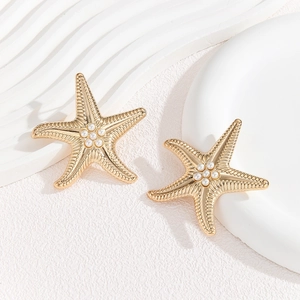 Élégantes boucles d'oreilles étoile de mer dorées avec perles blanches pour les vacances