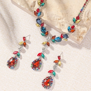 Luxurious floral zirconia jewelry set with colorful crystals and matching drop earrings