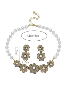 Detailed view of pearl flower necklace and earrings set with 42cm plus 8cm length dimensions